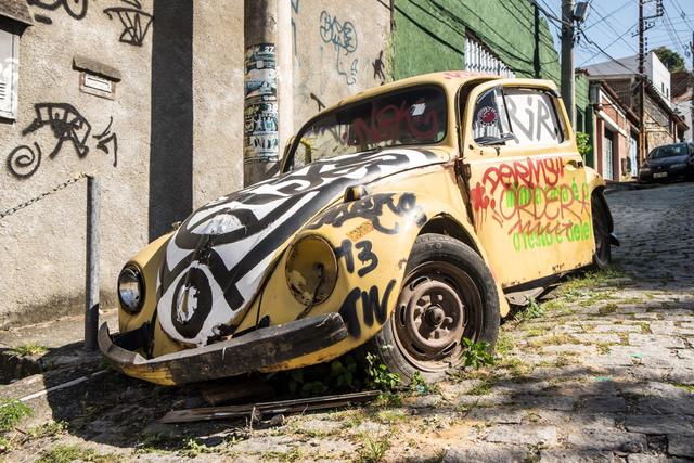 Old car with graffiti (Photo by vinnikava via Twenty20)