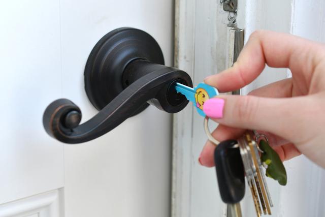 Unlocking a door (Photo by MargJohnsonVA via Twenty20)