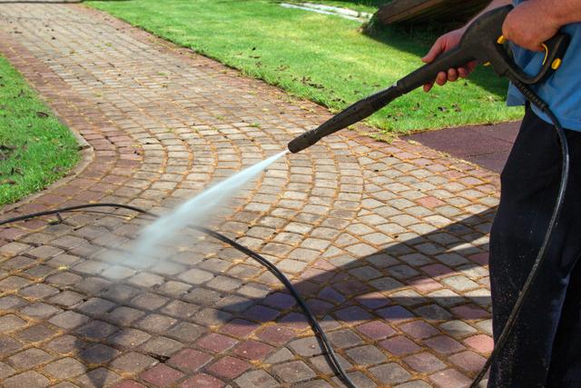 cleaning-street-with-high-pressure-power-washer-washing-stone-garden-paths_t20_8Ozx9g.jpg