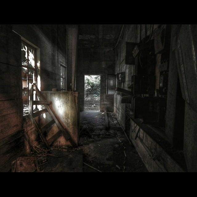 Interior of a dark abandoned silo in Guthrie, Oklahoma.