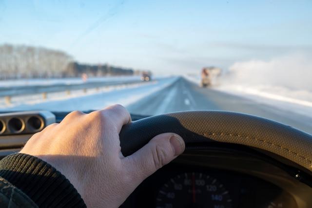 driver-hand-steering-wheel-car-driving-slippery-snow-highway-catching-up-truck-person-road-speed_t20_1nmoW1.jpg
