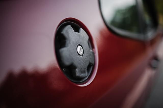 gas-car-red-car-car-gas-gasoline-trunk-closeup-shallow-depth-of-field-dof-cars_t20_V7N7L6.jpg