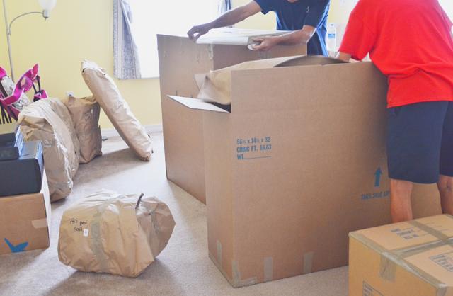 Unpacking after a move (Photo by 3happytails)
