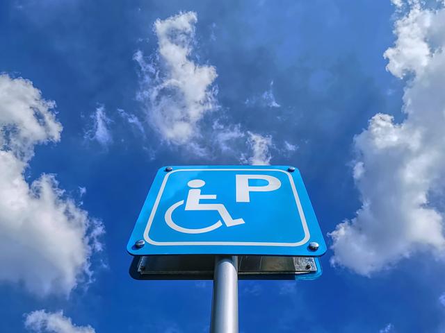 It is illegal to park in a handicap spot without a permit. Punishments include getting a ticket or being towed.