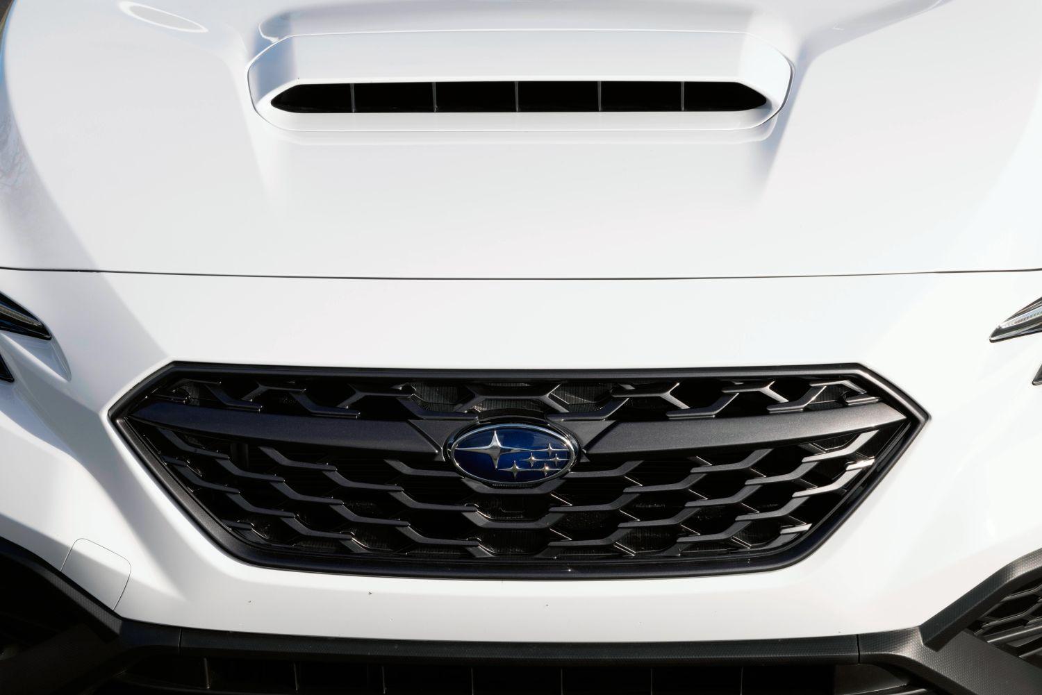 An up-close view of the front grille on a new 2022 Subaru WRX.