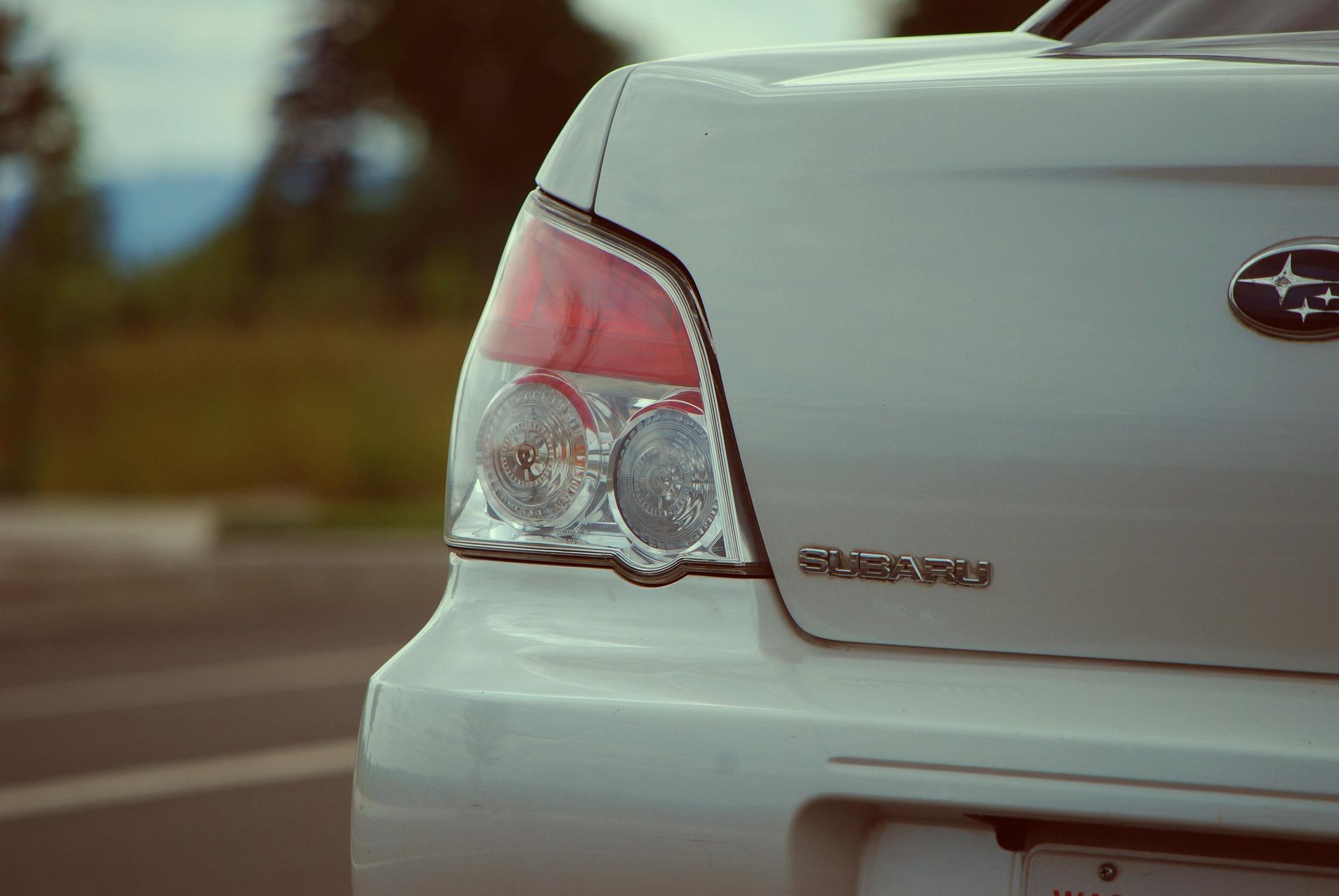 back of a white Subaru 