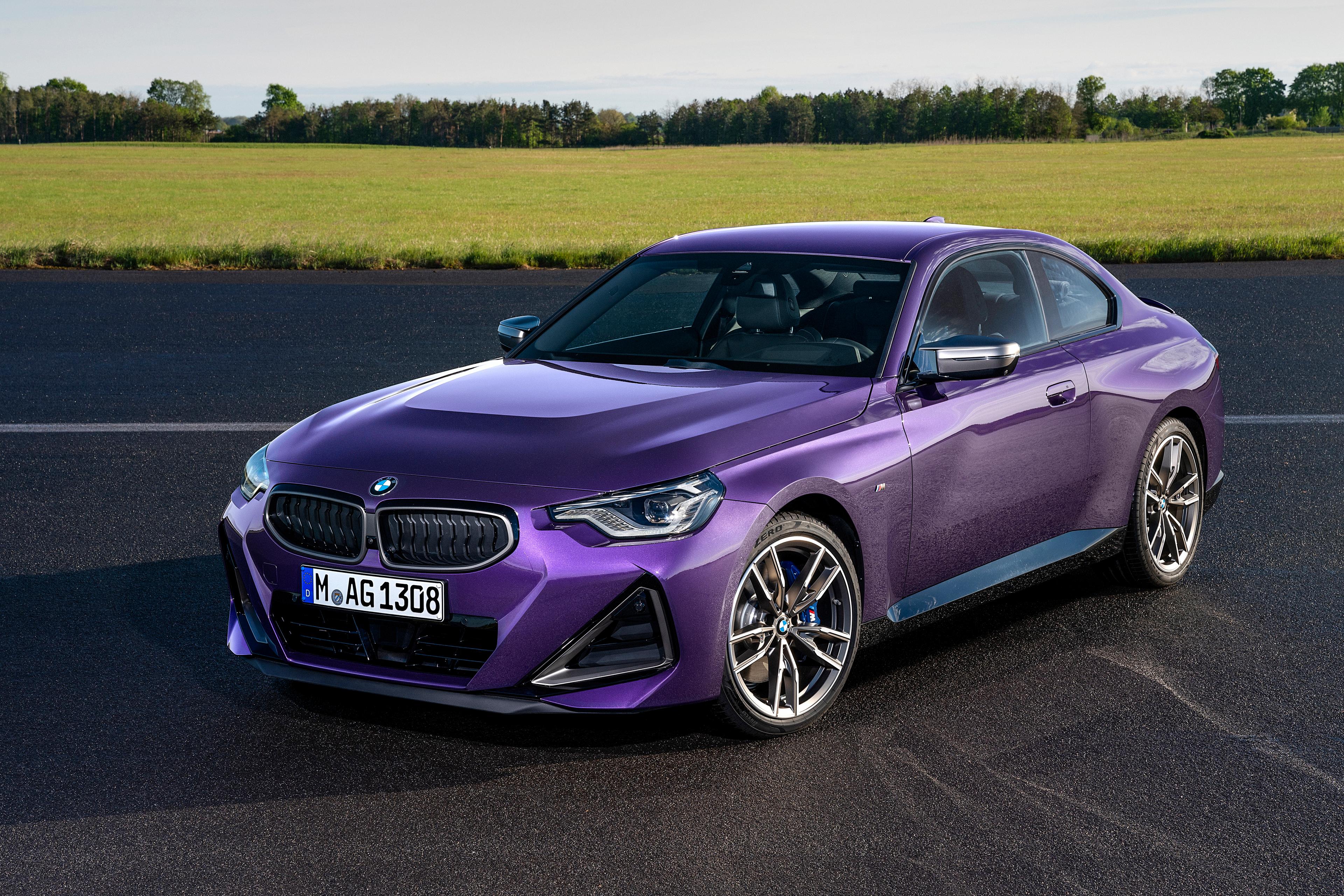 A purple 2022 BMW M240i parked outside