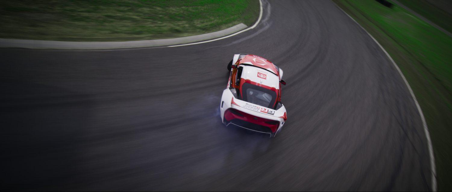 A Toyota self-driving car drifting around a turn.