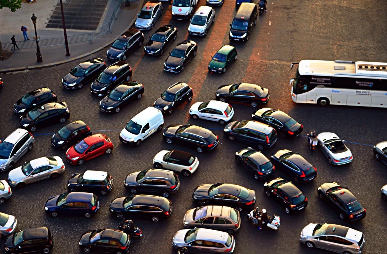 Cars in a traffic jam at an intersection.