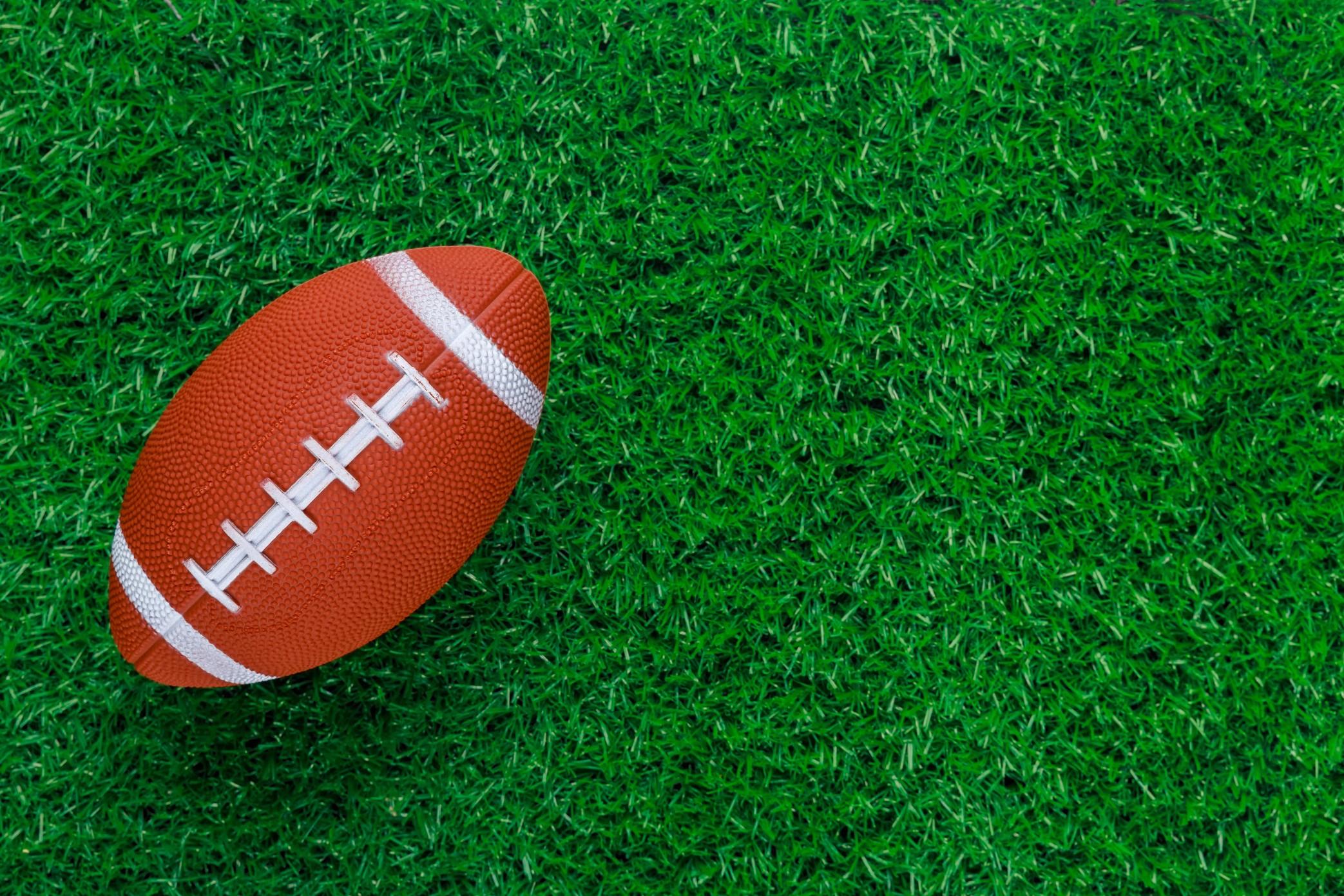 A football in the grass