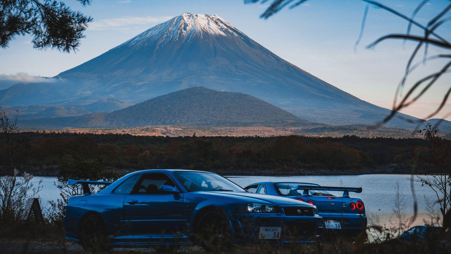 Nissan Skylines in front of Mount Fuji
