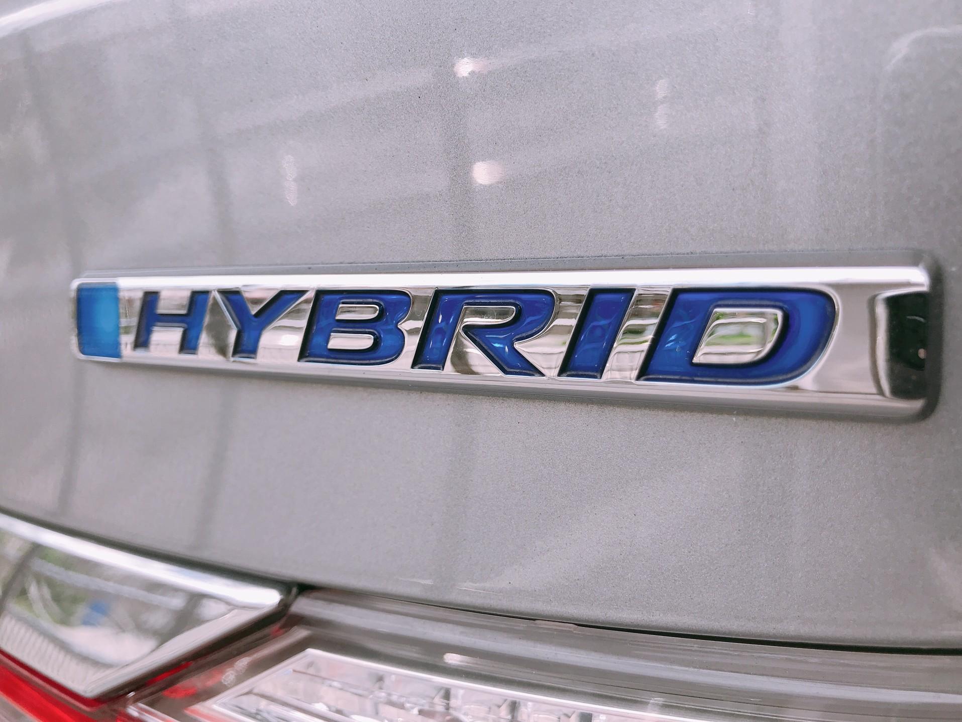 Do you know when the first hybrid car was developed?