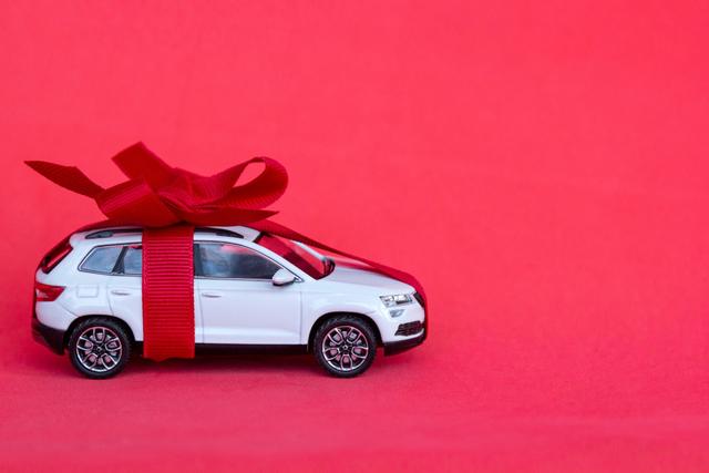 1662521989628_tst-petersburg-russia-december-3-2019-oy-new-car-gift-with-red-bow-on-red-background-concept-rental_t20_0xKkpk.jpg.jpeg