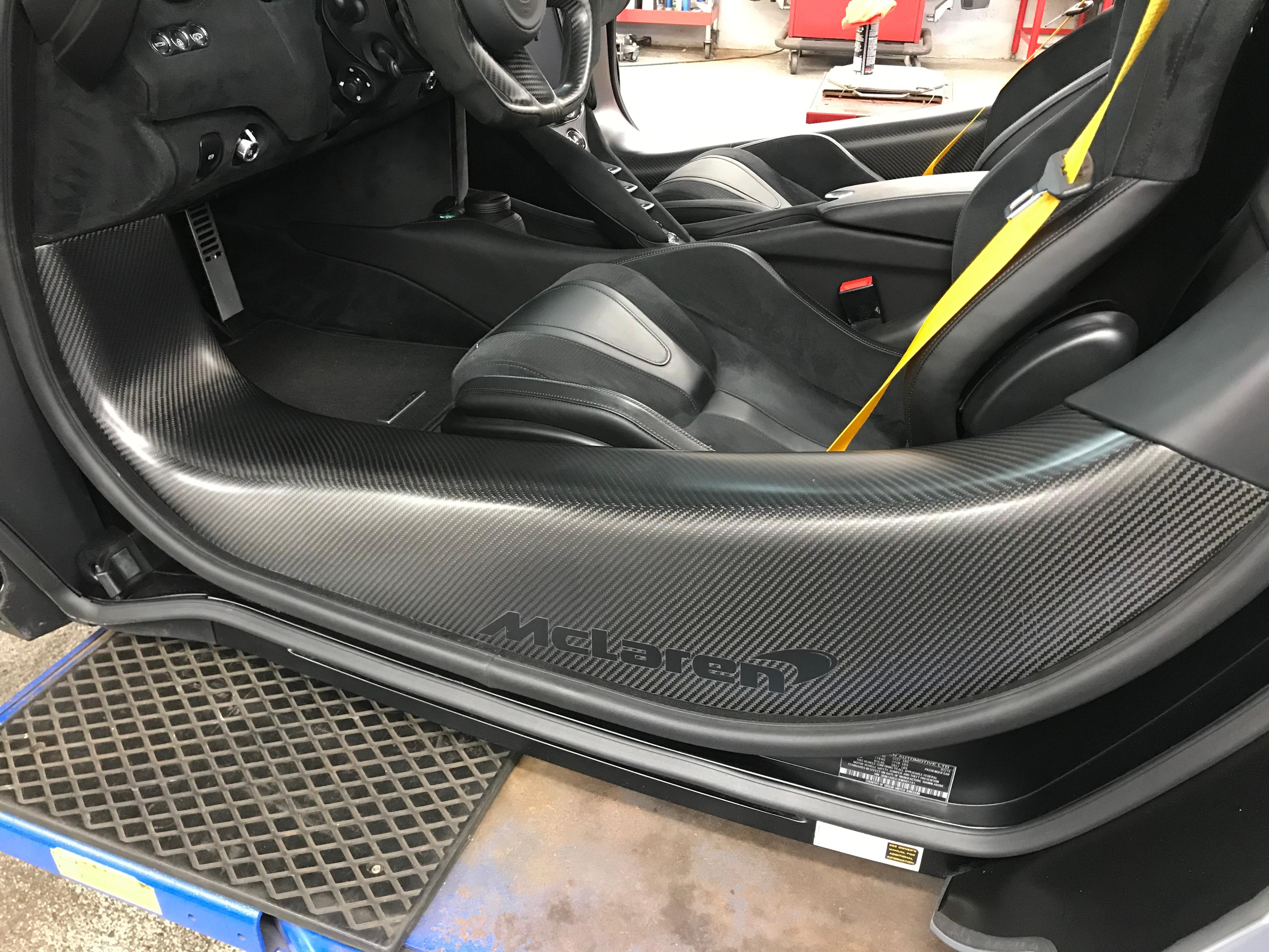 McLaren carbon fiber door inserts