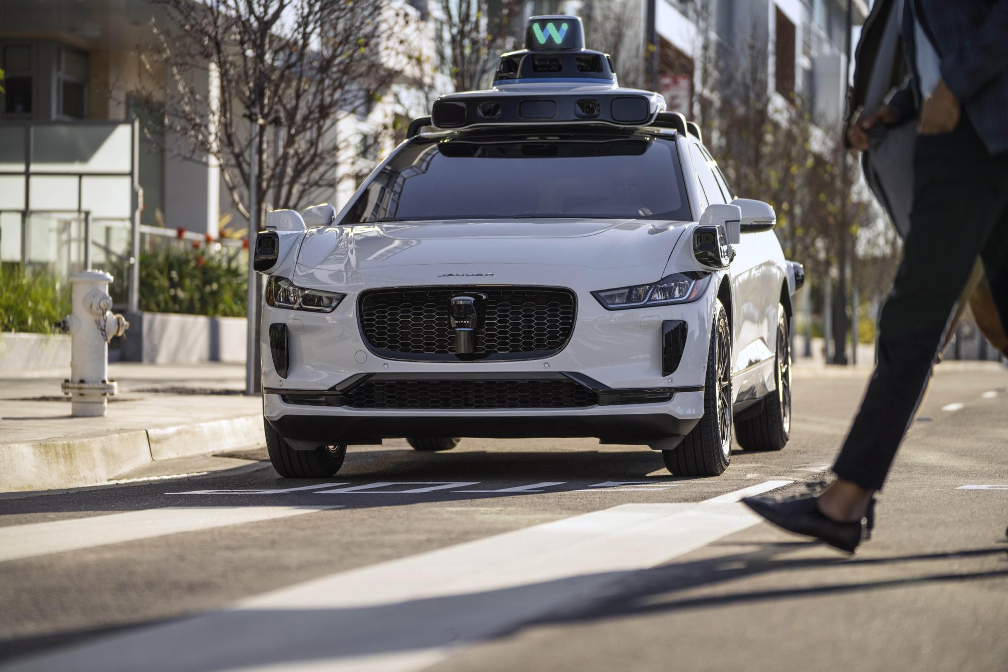 Waymo’s autonomous technology is showcased in the Jaguar I-Pace, which offers taxi rides in San Francisco.