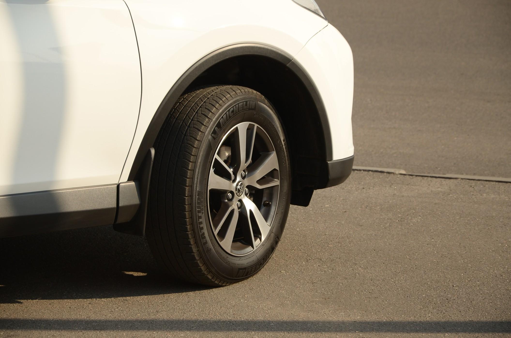 Toyota car wheel with original aluminium rims.